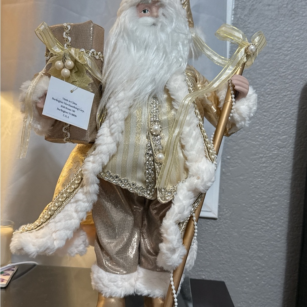 Elegant Gold and White Santa Figurine